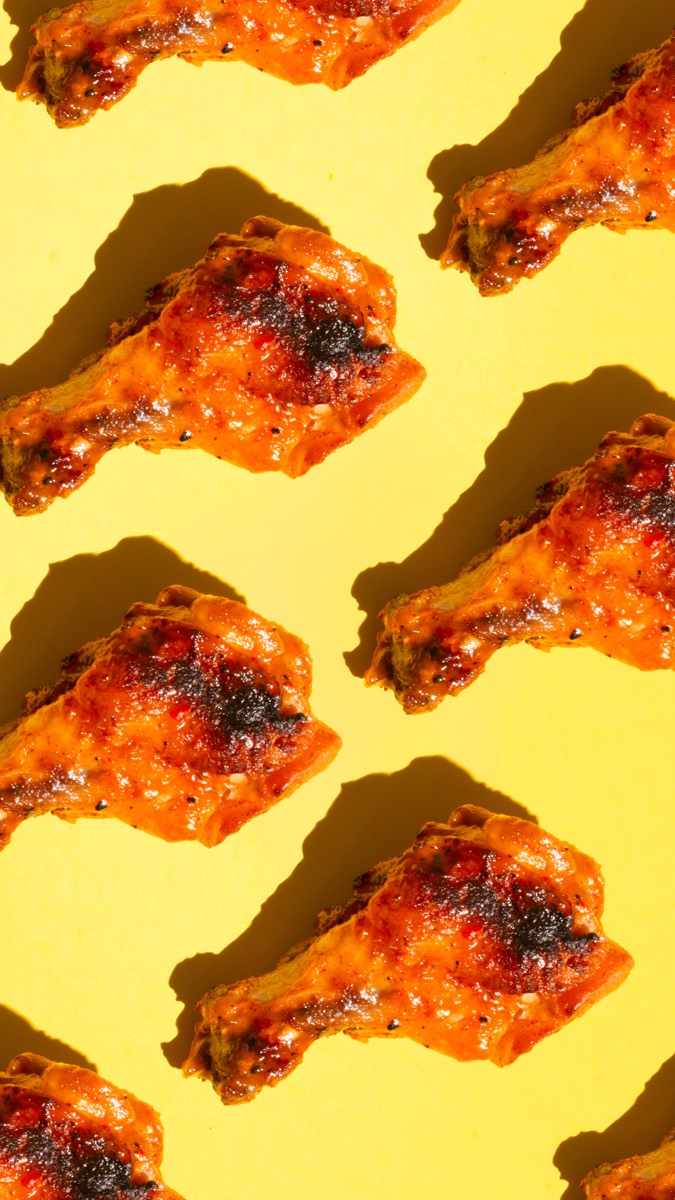 Graphic pattern of grilled chicken on yellow